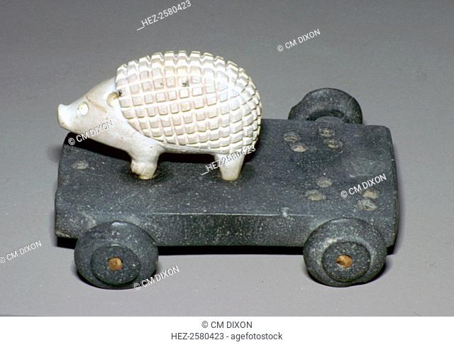 Hedgehog mounted on a wheeled carriage made of calcite and bitumen, from Susa
