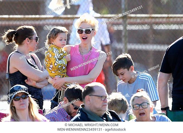 Gwen Stefani watches her son Zuma Rossdale play flag football at the park. Her two other sons, Kingston and Apollo, attended as well