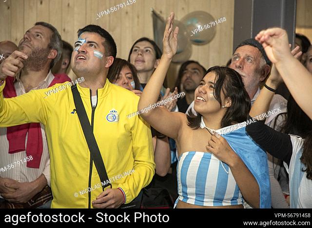 Argentine fans react during a soccer game between France and Argentina, the final of the FIFA 2022 World Cup, at 'The Football Village Brussels'