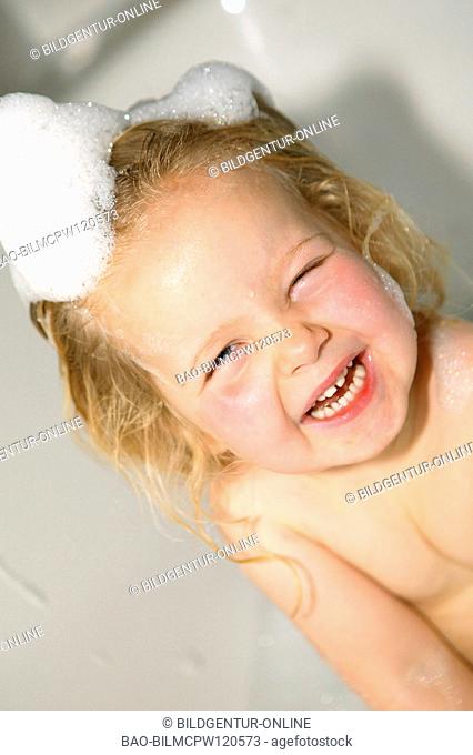 child taking at bath