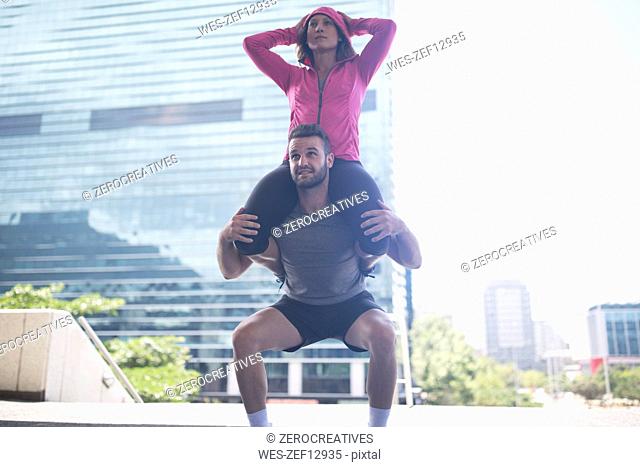 Couple exercising in the city