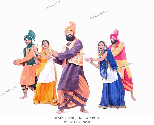 Dancers performing folk dance bhangra MR779B, 779C, 779D, 779E, 779F