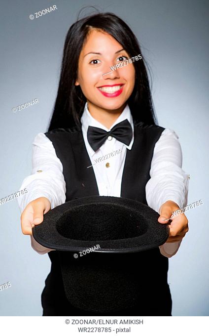 Woman magician in funny concept