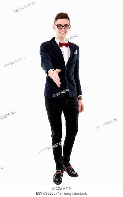 Handsome young businessman stretches out his hand to introduce himself