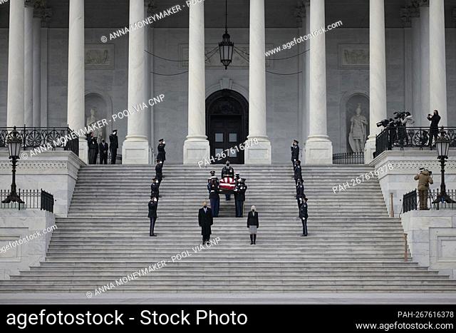 WASHINGTON, DC - DECEMBER 10: Senate Sergeant at Arms Karen Gibson (R) and House Sergeant at Arms William J. Walker (L) lead a joint services military honor...