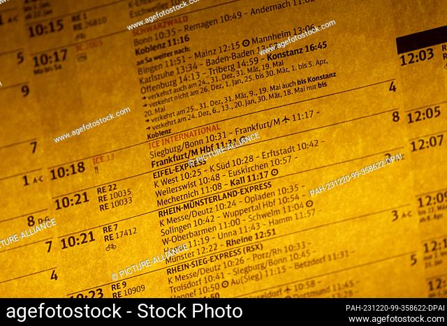20 December 2023, North Rhine-Westphalia, Cologne: Deutsche Bahn timetables show arrival and departure times. In a ballot that ended on Tuesday
