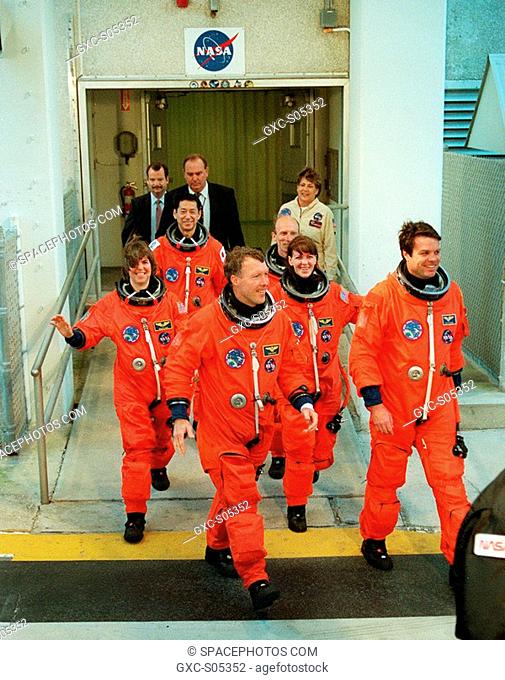 01/14/2000 --- The STS-99 crew leave the Operations and Checkout Building on their way to Launch Pad 39A and a simulated countdown exercise
