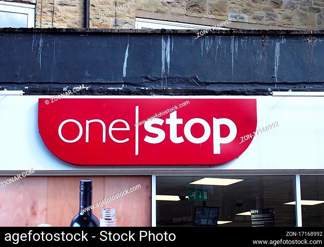 hebden bridge, west yorkshire, united kingdom - 22 may 2021: sign above a one stop convenience store in hebden bridge
