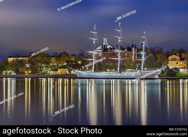 Harbour Chapman off Skeppsholmen, red admiralty house, illuminated, Stockholm, Sweden, Europe