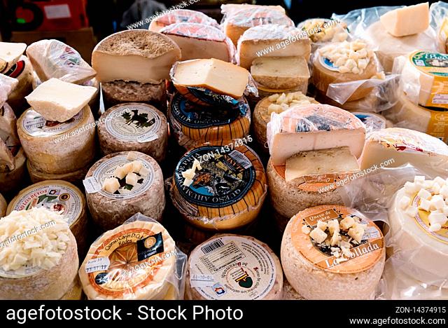 Cangas de Onis, Spain - March 31, 2019: Assortment of traditional asturian cheeses ready to taste in food market
