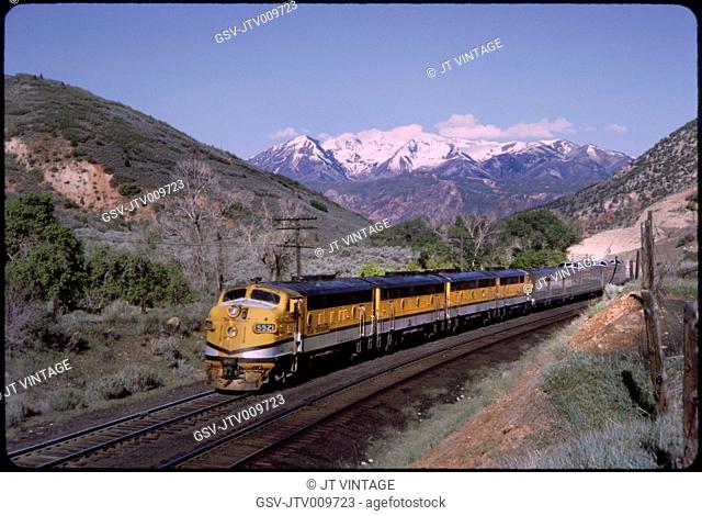 California Zephyr Train with Snow-Capped Mountains in Background, Utah, USA, 1964