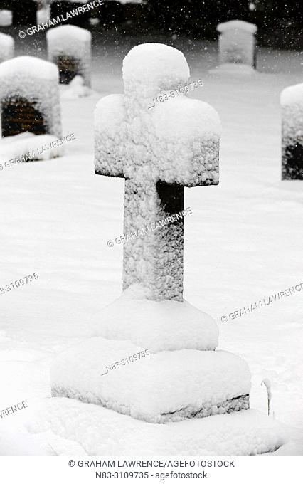 St Mary's Church graveyard is covered with snow at Builth Wells, Powys, Wales, UK
