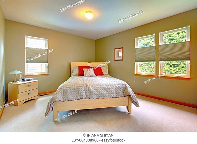 Large and bright guest bedroom with lots of windows