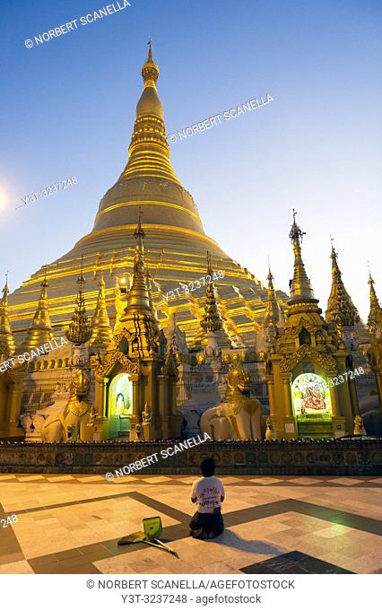 Myanmar (formerly Burma). Yangon. (Rangoon). The Shwedagon Pagoda Buddhist holy place is the first religious center of Burma because according to the legend