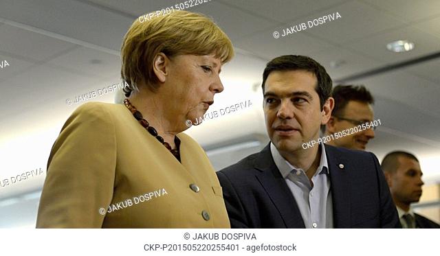German Chancellor Angela Merkel and Greece Prime Minister Alexis Tsipras attend the Eastern Partnership summit in Riga, Latvia, on Friday 22 May 2015