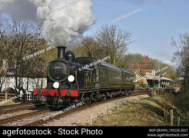 UK - England East Sussex Horsted Keynes BR Black E4 No. 32473 leaves Kingscote, Bluebell Railway on 3rd March 2005. 32473 BR Black E4 No