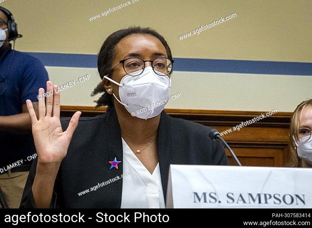 Kelly Sampson, Senior Counsel and Director of Racial Justice Brady: United Against Gun Violence, remains seated while she is sworn-in during a House Committee...