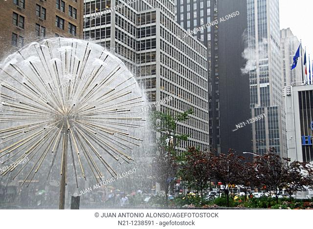 Dandelion Fountain on Avenue of the Americas –Sixth Avenue- at  West 54th Street. Midtown Manhattan.  New York, New York. USA