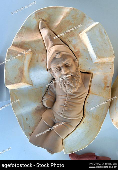 27 July 2021, Thuringia, Trusetal: The mould for casting a garden gnome is on display at the museum in the gnome park. The gnome park celebrates the 25th...