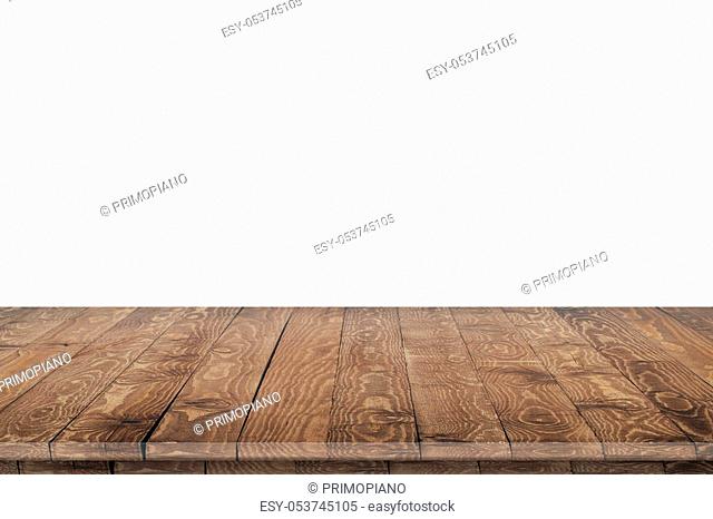 Empty wooden table for product placement or montage with focus to table top in the foreground, with white background. Wooden board empty table perspective