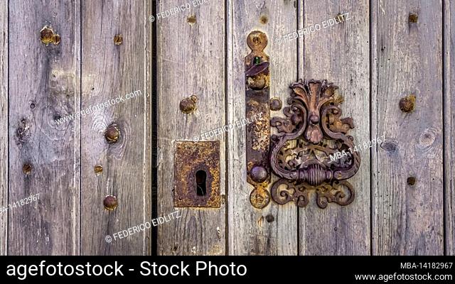 Old door knocker in Assignan