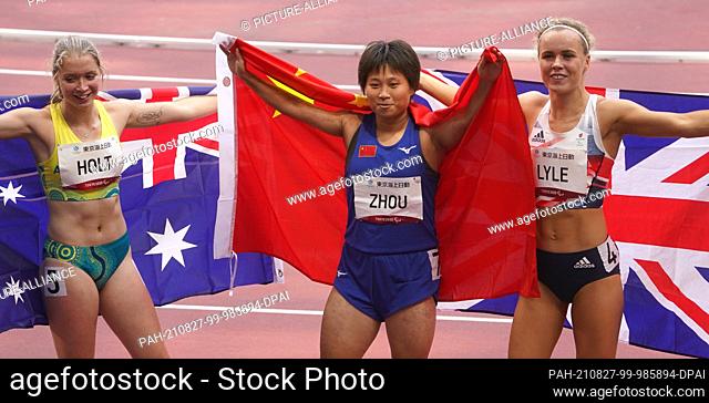 27 August 2021, Japan, Tokio: Paralympics: Athletics, 100m, women, final, at Olympic Stadium. Silver medallist Isis Holt (l-r) from Australia