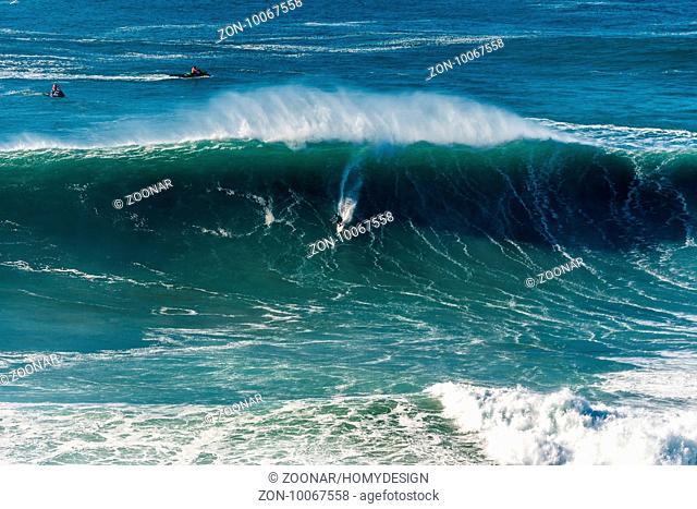NAZARE, PORTUGAL - DECEMBER 20, 2016: Carlos Burle (BRA) during the Nazare Challenge 2016 - Big Wave Tour #3 at Praia do Norte - Nazare, Portugal