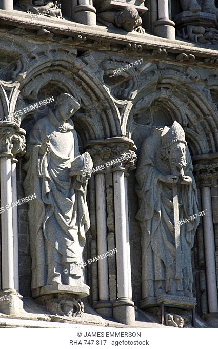 Macabre two figure detail from the front of Nidarosdomen Og Cathedral, Trondheim, Norway, Scandinavia, Europe