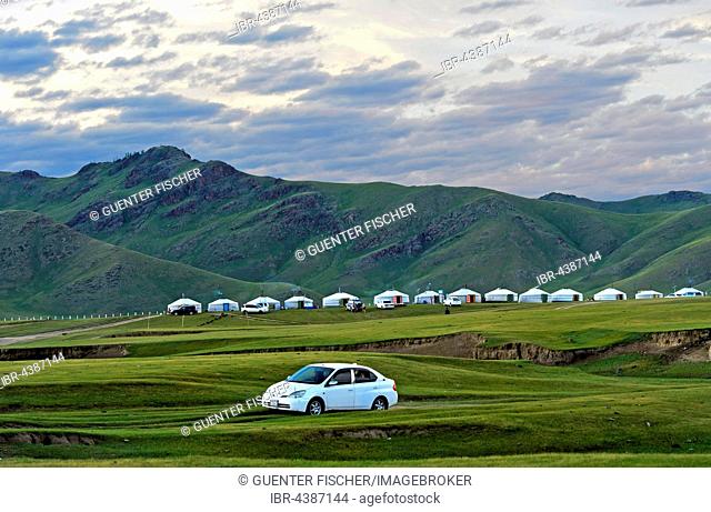 Hilly green countryside, jurts, nomad camp in Orkhon Valley, Mongolia
