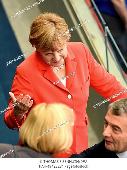Chancellor of Germany Angela Merkel seen on the stands with Wolfgang Niersbach (r), President of the German Football Association (DFB) prior to the FIFA World...
