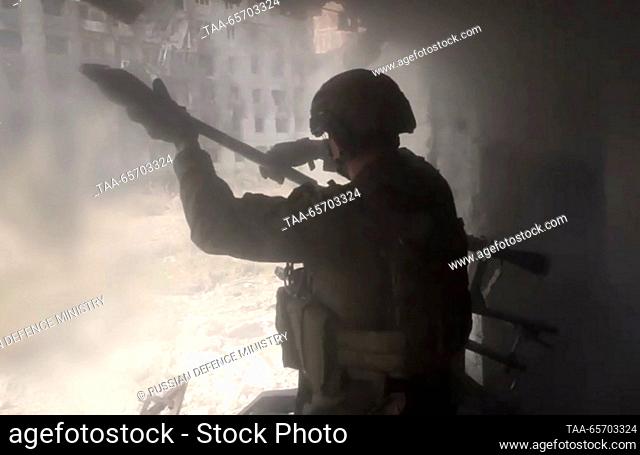 DECEMBER 13, 2023: A serviceman provides fire support to a reconnaissance unit of the Southern Group of Forces by suppressing Ukrainian fire nests in the ruins...