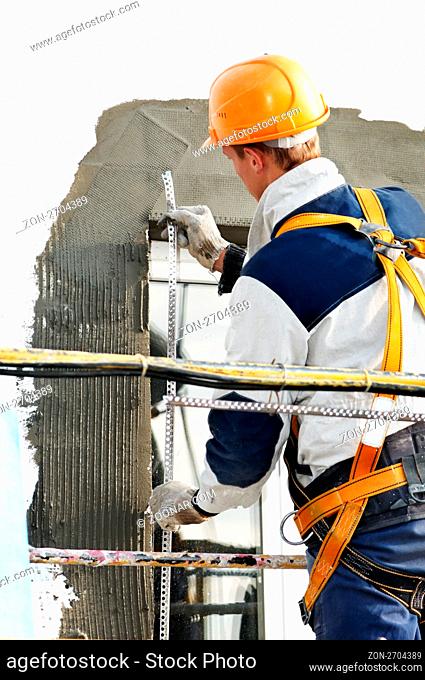 facade thermal insulation works with stopping and surfacer