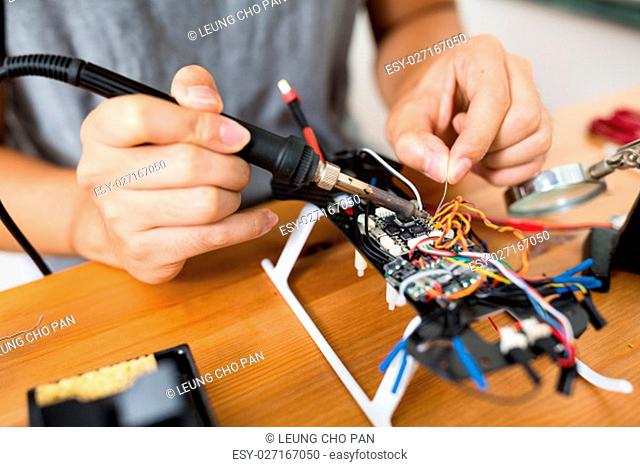 Welding wires on flying drone board