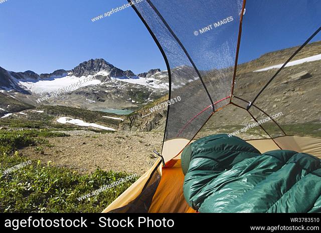View from inside a tent of Russell Peak and Limestone Lakes Basin in Height-of-the-Rockies Provincial Park