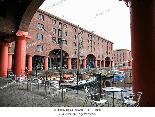The restored old warehouse buildings at Albert Dock docks Liverpool England UK