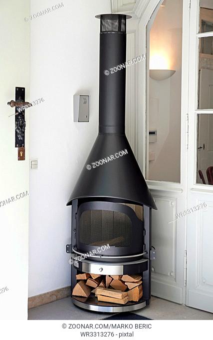 Modern Black Woodburning Stove With Chimney