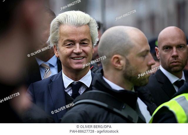 The Dutch rightwing populist and leader of the Partij voor de Vrijheid (Party for Freedom, PVV) Geert Wilders (C) on the campaign trail in Spijkenisse in South...