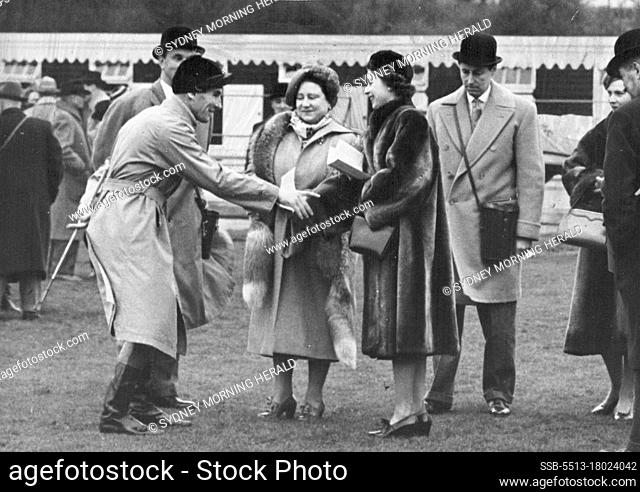 The Queen Elizabeth and Princess Elizabeth, who went to Hurst Park to see the Queen's horse Devon loch run, are amused by jockey Brian Marshall's graphic...