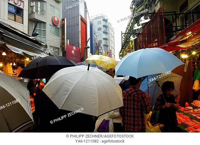 Umbrellas dancing at the street market in Ameyoko, Ueno