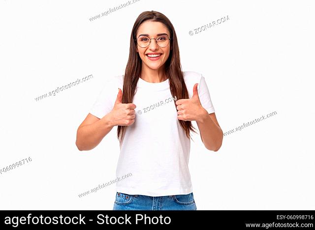 Good idea, lets do it. Enthusiastic smiling caucasian woman in glasses, fully support your plan, show thumbs-up and nod in approval, grinning positive reply