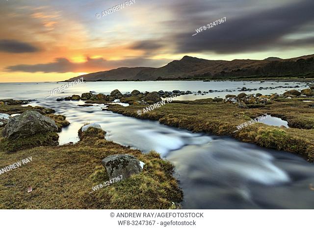 A stream leading into Loch Buie on the Isle of Mull captured at sunset in early November. A long shutter speed was utilised to blur the movement in the water...