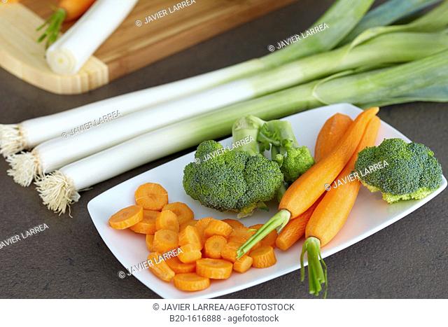 Cooking vegetables leeks, broccoli, carrots, Kitchen