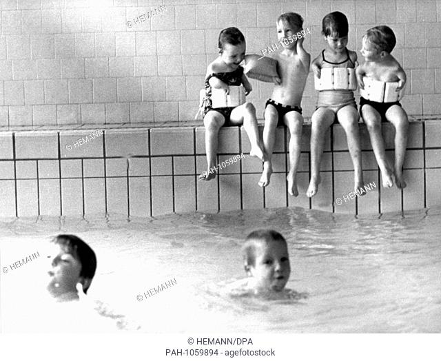 Disabled children at swim practice in a photograph taken in May 1968. They are part of a group of handicapped children cared for by the city day care center for...