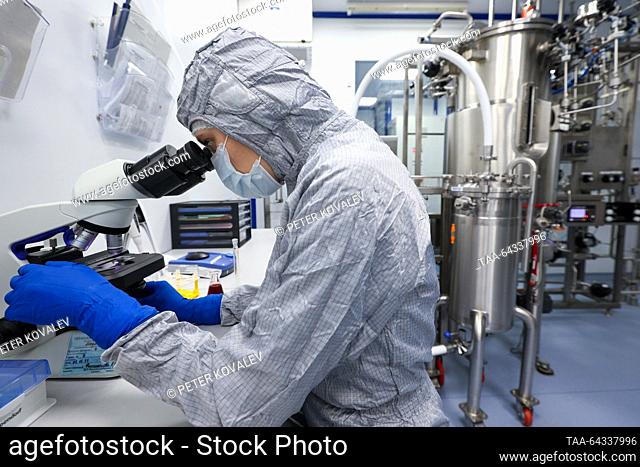 RUSSIA, ST PETERSBURG - NOVEMBER 3, 2023: An employee looks through a microscope at a recombinant DNA (rDNA) medication shop at St Petersburg Research Institute...