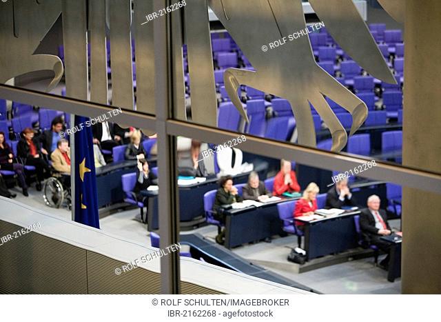 Parliamentary session in the Plenary Assembly Hall of the Reichstag building, part of the German federal eagle is in the foreground, Berlin, Germany, Europe