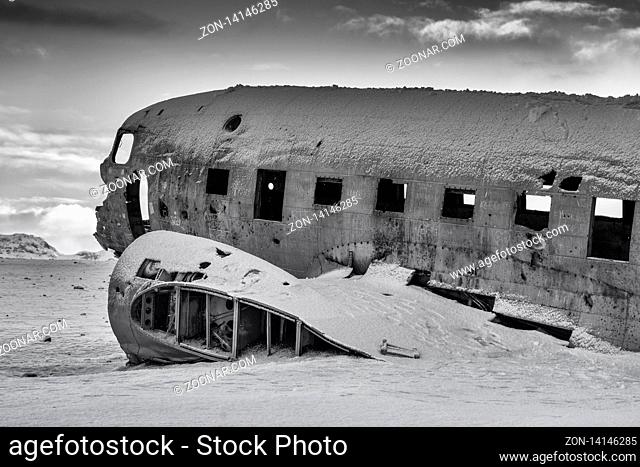 VIK, ICELAND - FEBRUARY 15, 2019: Wreck of the crashed DC 3 plane, covered by snow on a winter day on February 15, 2019 in Vik, Iceland