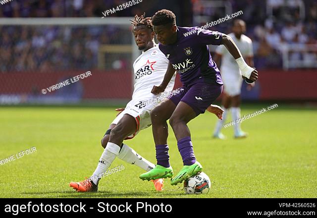 OHL's Hamza Mendyl and Anderlecht's Noah Sadiki fight for the ball during a soccer match between RSCA Anderlecht and OH Leuven