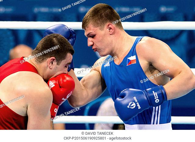 Czech boxer Daniel Taborsky, right, and Yan Sudzilouski (BLR) fight in Men's Super Heavy Round of 16 match at the Baku 2015 1st European Games in Baku