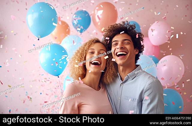 Expectant parents are having a gender reveal party. Blue and pink balloons and pink confetti. Family, pregnancy and holiday concept