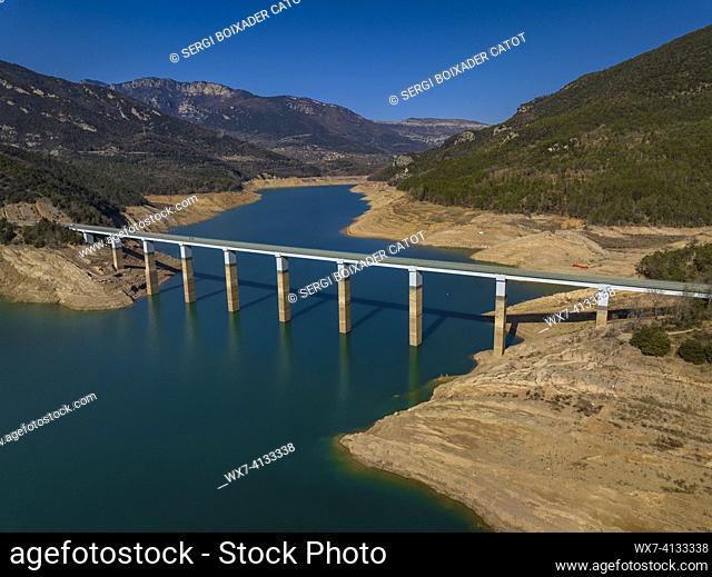 Aerial view of the Baells reservoir with a very low water level during the 2022-23 drought (Berguedá, Barcelona, Catalonia, Spain)